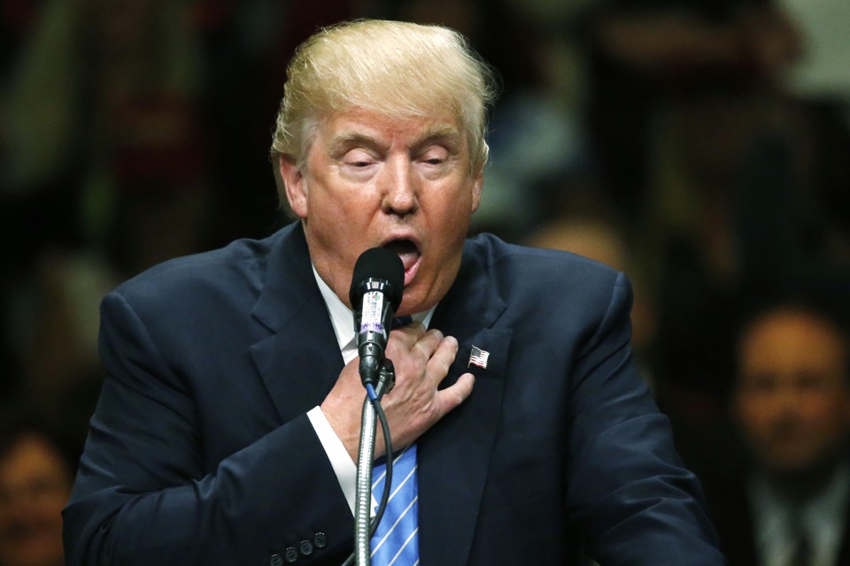 Republican U.S. presidential candidate Donald Trump refers to former Republican presidential nominee Mitt Romney, who lost the 2012 presidential election, as a "choker" at a rally with supporters in Anaheim, California, U.S., May 25, 2016. REUTERS/Jonathan Ernst - RTSFXMO
